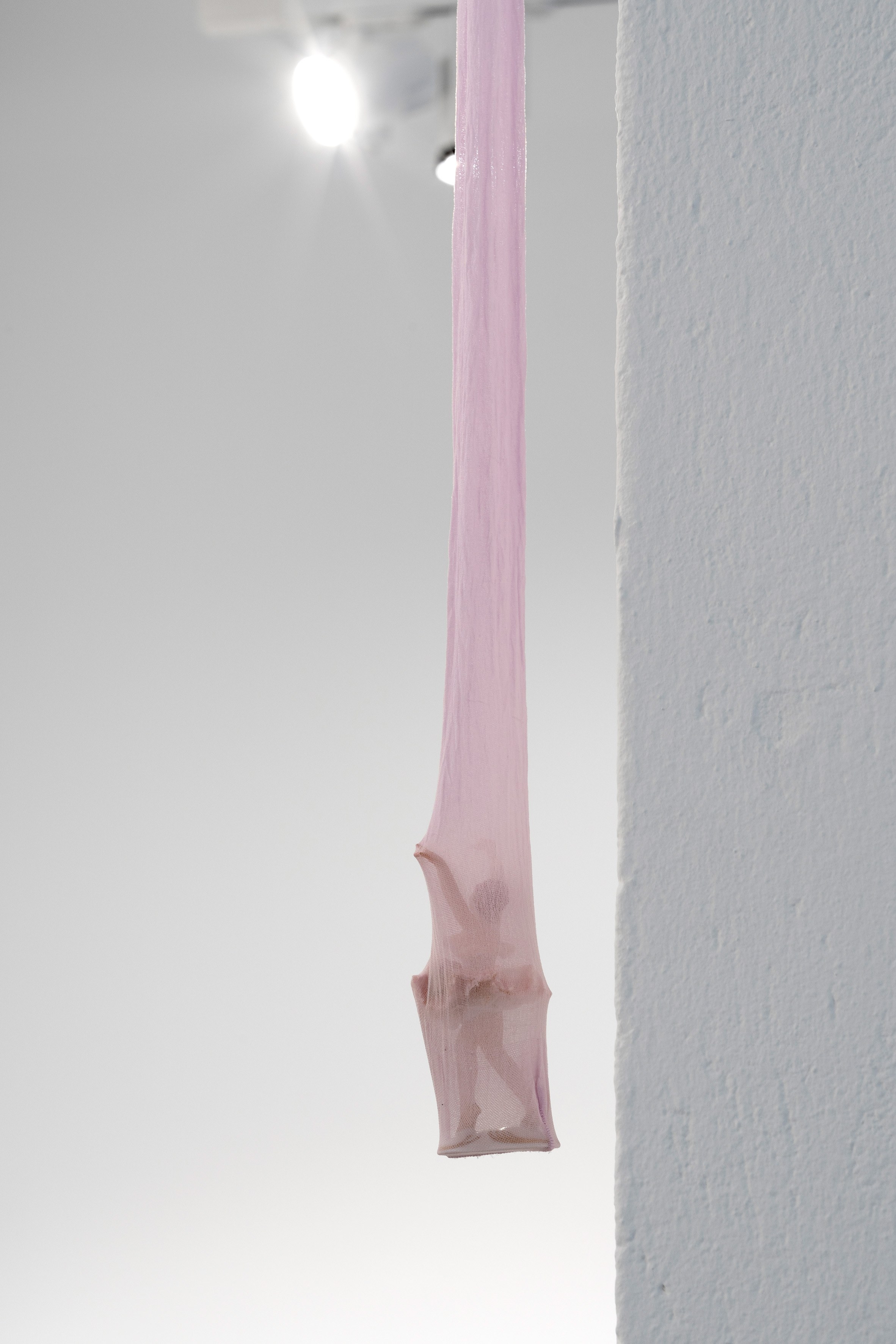 Pavla Sceranková, Star(r)ing, 2026, ceramic, stocking, 10 × 6 × 6 cm (variable)