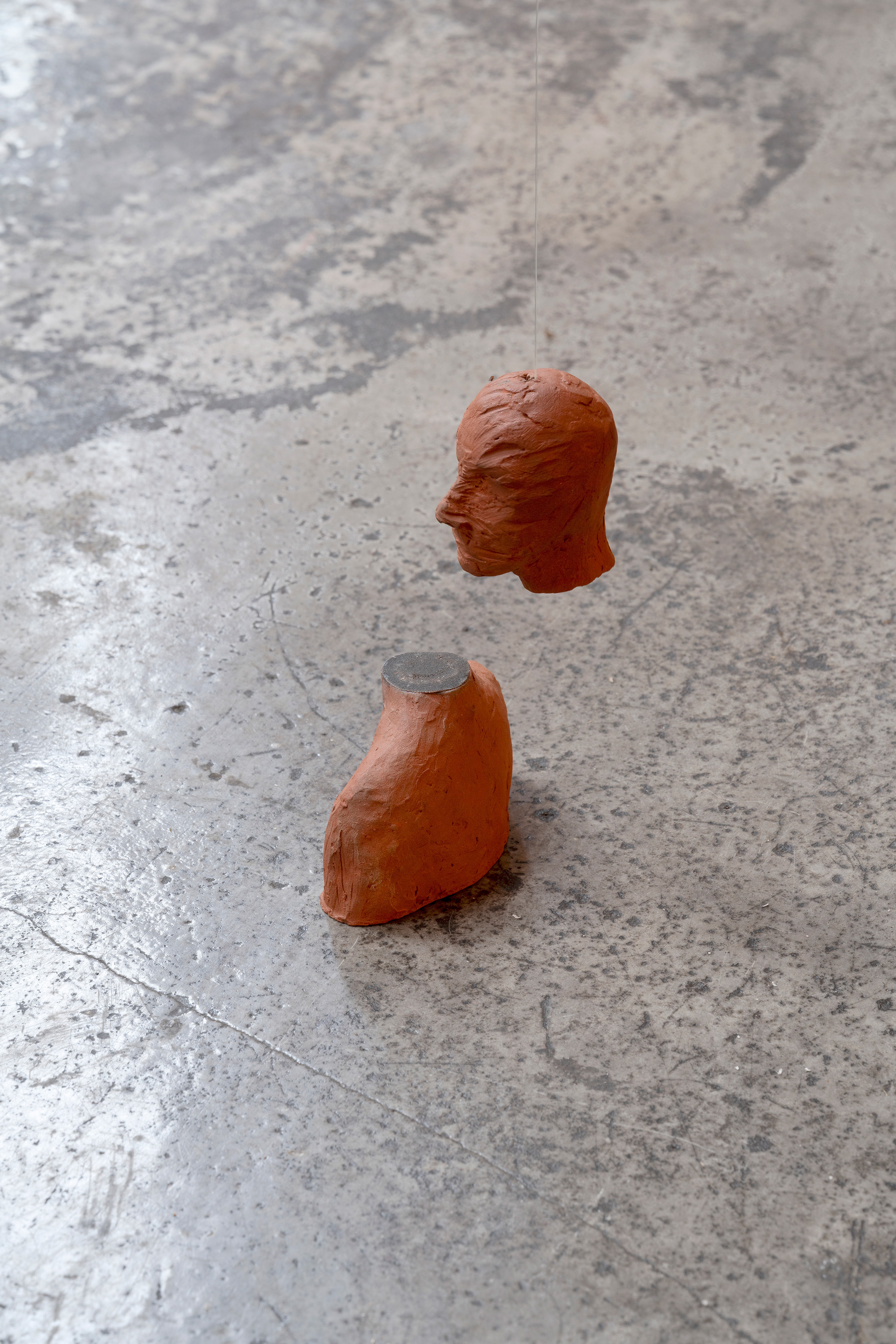 Pavla Sceranková, Offended Head, 2023, ceramics, magnets, 15 × 10 × 3 cm