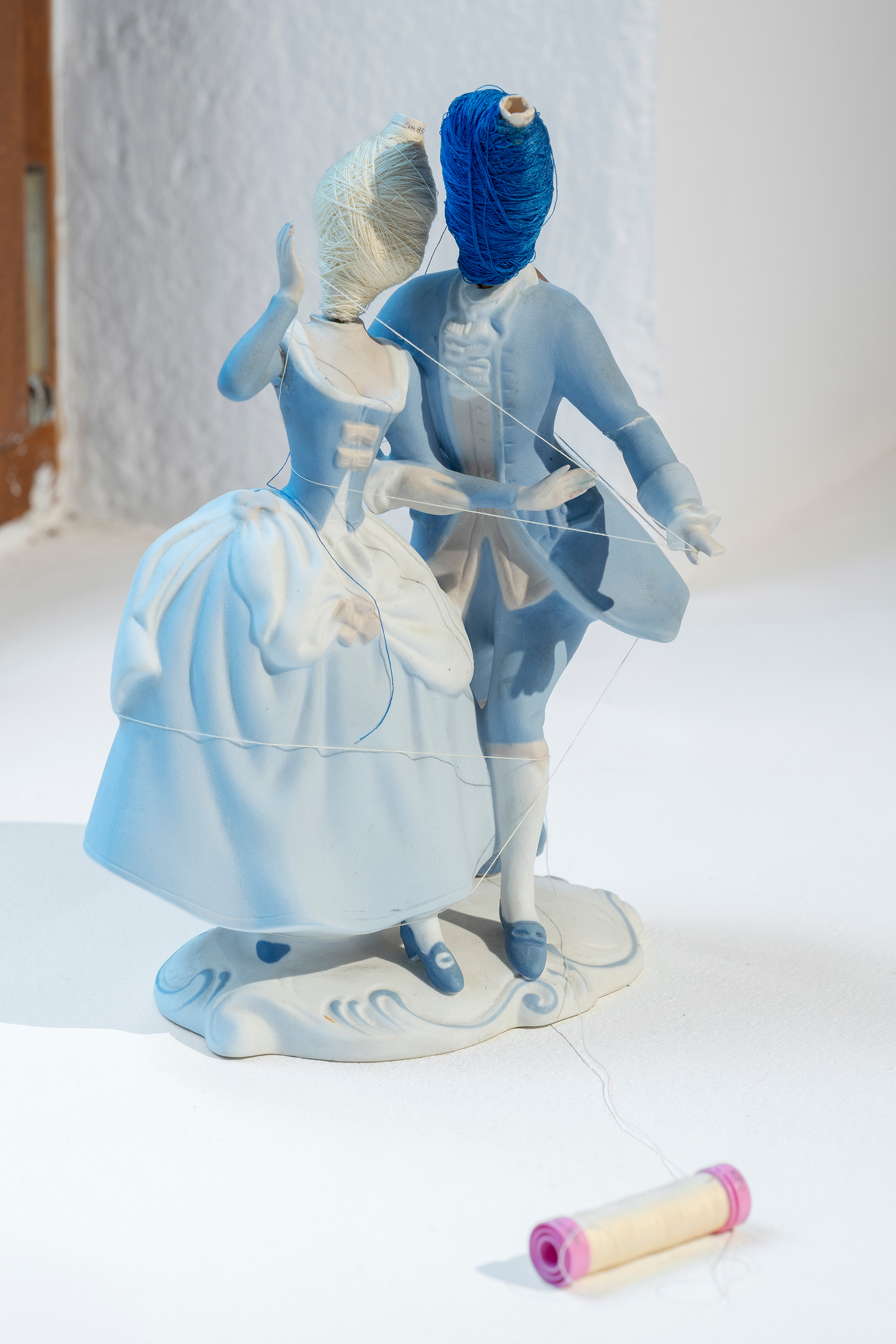 Pavla Sceranková, Head that swells with false promises, 2023, porcelain, thread, 25 × 18 × 10 cm