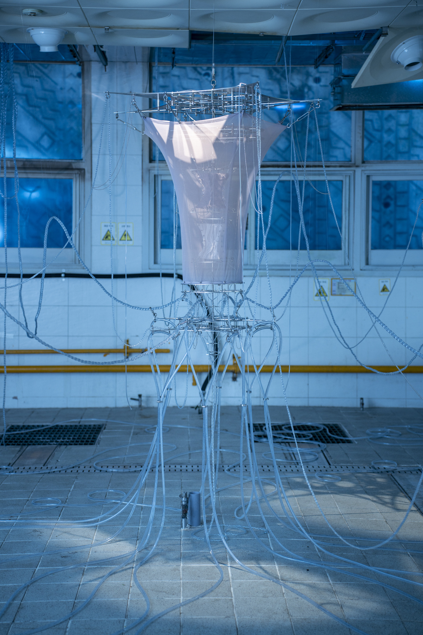 We Were Trembling as If in Cold Water, 2026, two-channel sound installation; fabric, stainless steel, PVC, LED, hose, water pump and air circulation system, dimensions variable. Commissioned by Busan Biennale Organizing Committee, 2026.