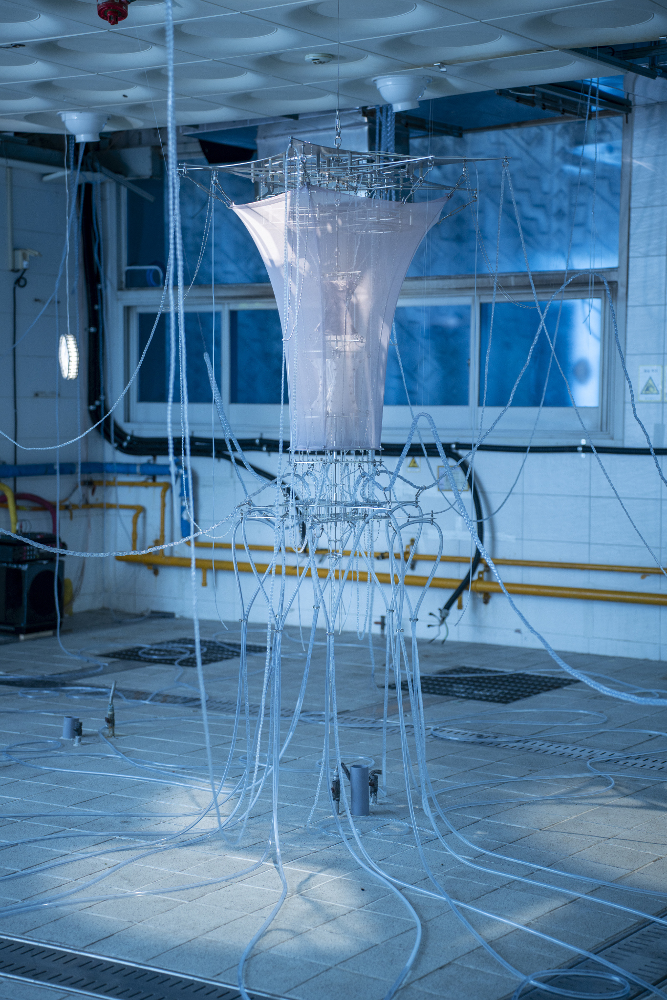 We Were Trembling as If in Cold Water, 2026, two-channel sound installation; fabric, stainless steel, PVC, LED, hose, water pump and air circulation system, dimensions variable. Commissioned by Busan Biennale Organizing Committee, 2026.